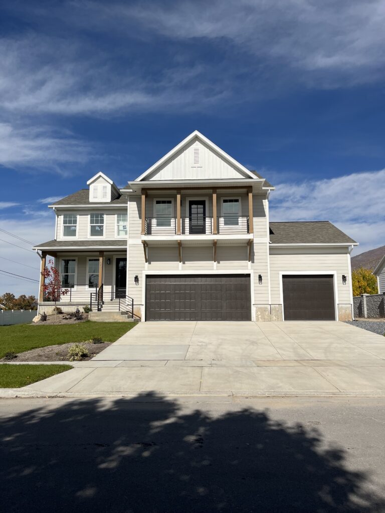 Two story home with gabled roof